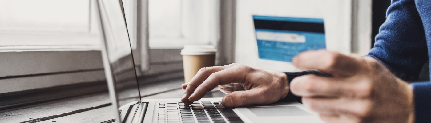 Consumer online shopping using their credit card.