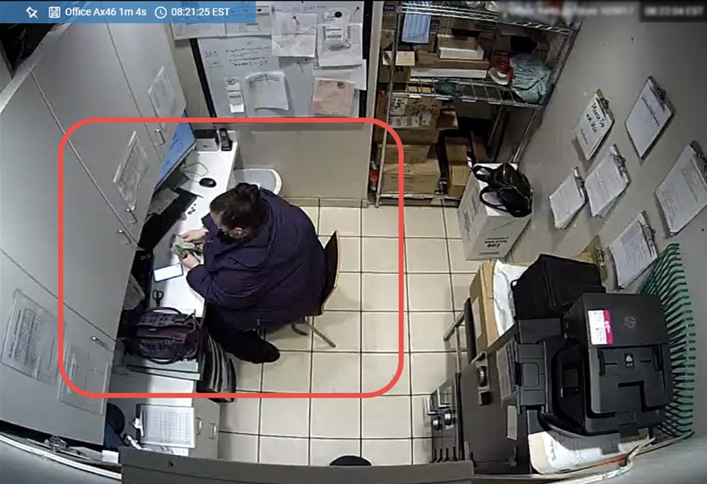 QSER facing money counting in office_camera