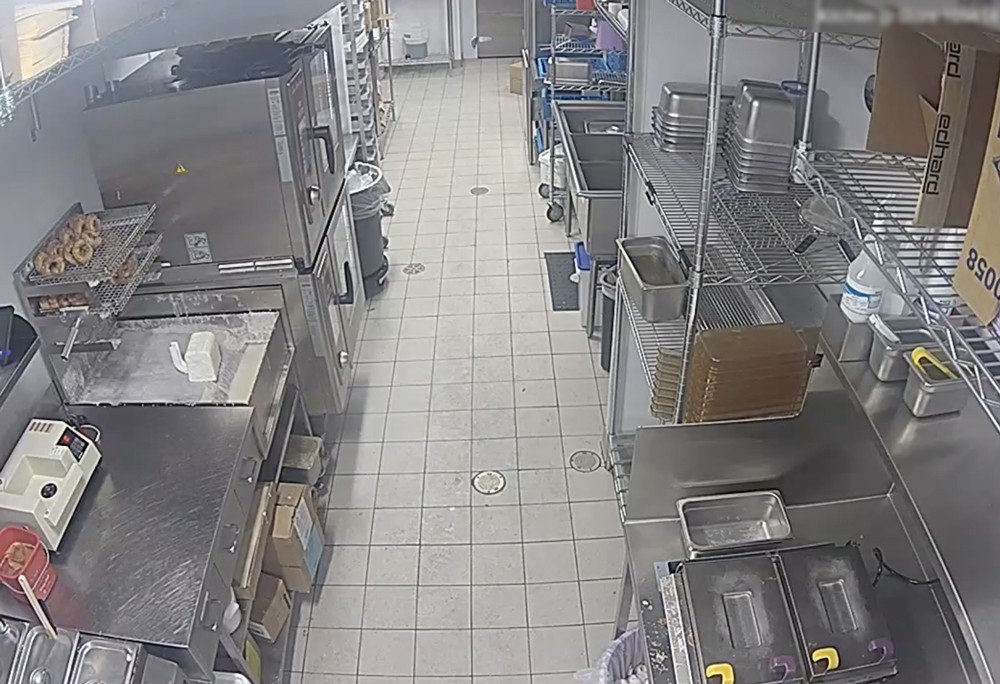 A view of a kitchen with a lot of equipment.