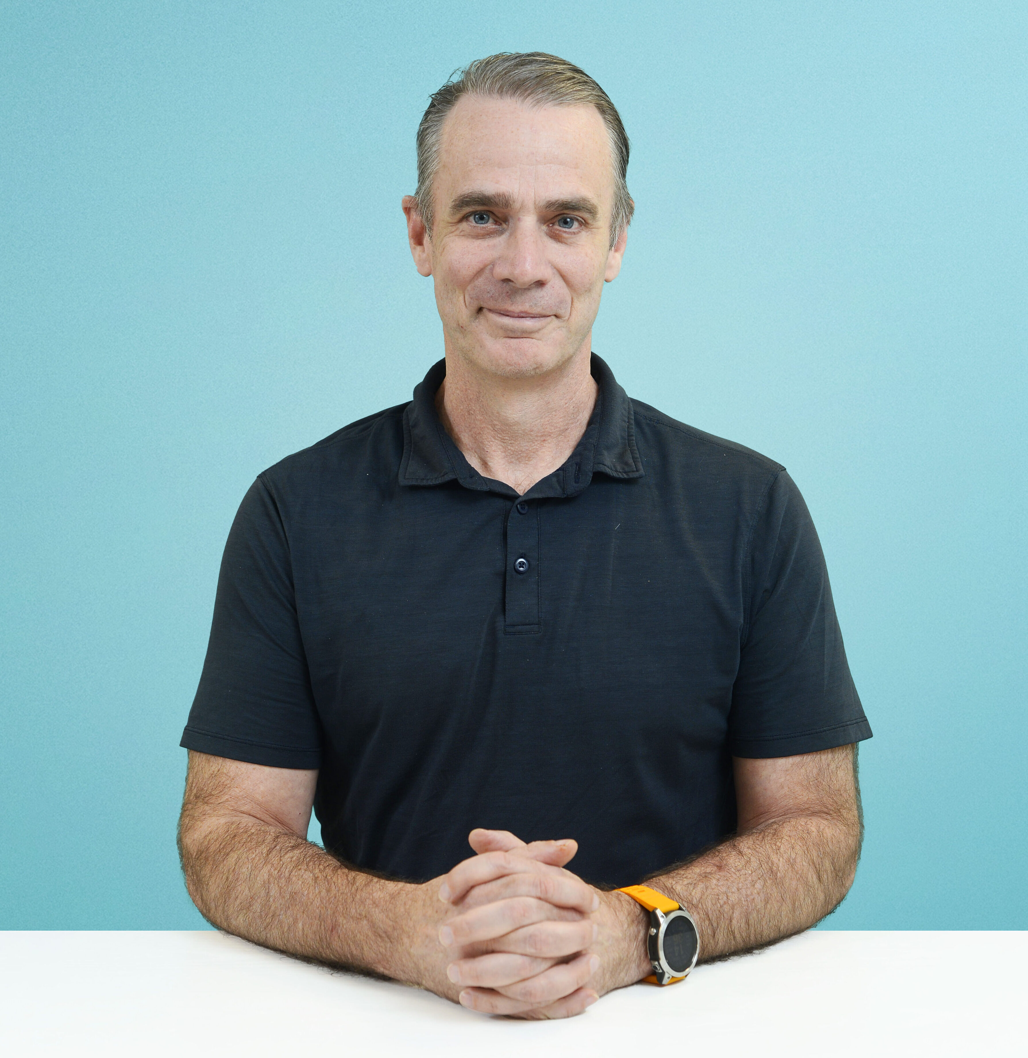 Image showing Darryl Humpphris, CFO, Solink, with a baby blue background.