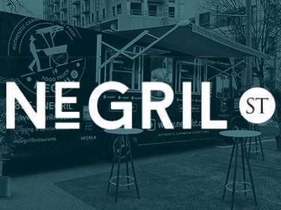 Negril St logo with a blue overlay in the background