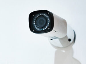 This is a thumbnail image of a bullet security camera, shown primarily as part of a troubleshooting guide.