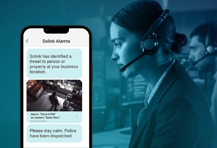 A smartphone displays a security alert notification alongside a call center operator wearing a headset.