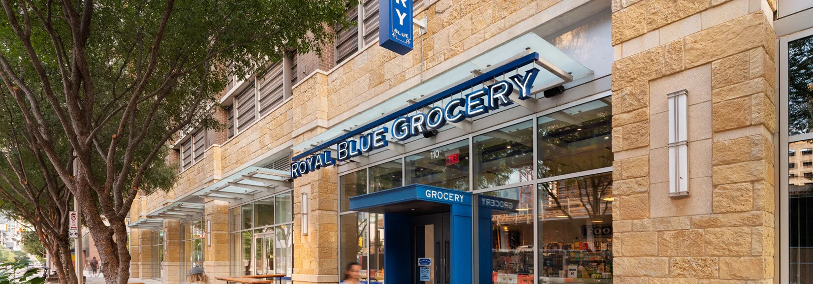 The entrance to a building with a blue door.