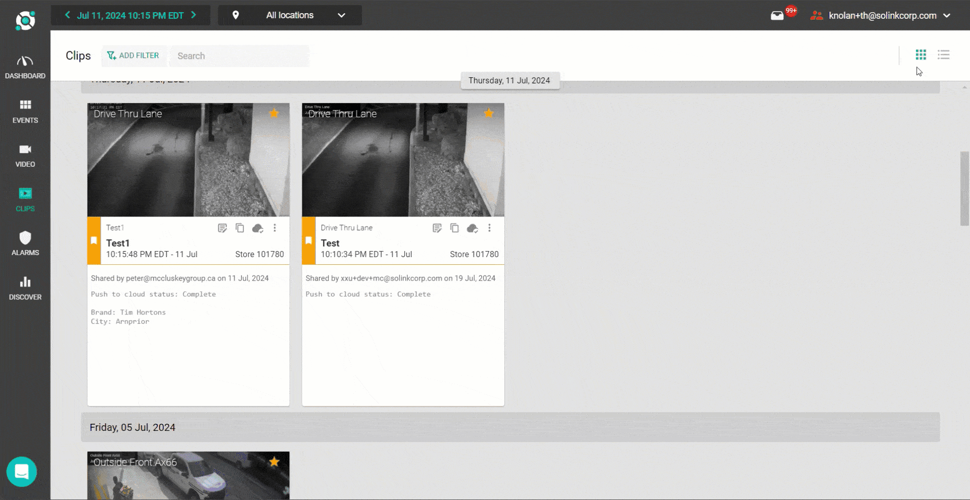 A dashboard displaying security camera footage clips dated Thursday, July 11, 2024. Two clips from "Drive Thru Lane" show timestamps and status updates. User email is partially visible in the top right corner.