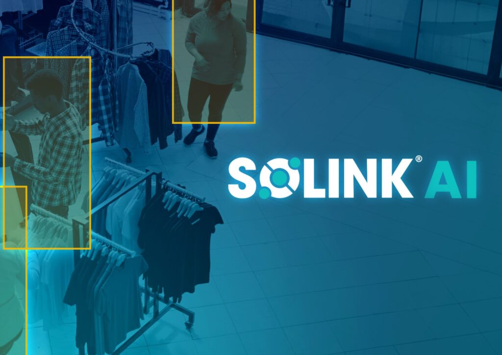 Security camera view of a retail store with highlighted individuals, featuring the Solink AI logo in the center.