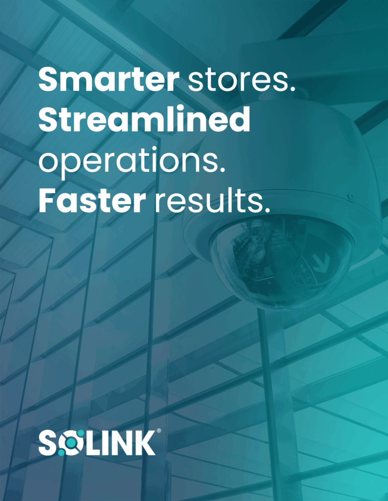 A security camera mounted inside a modern glass building with text: "Smarter stores. Streamlined operations. Faster results. SOLINK.