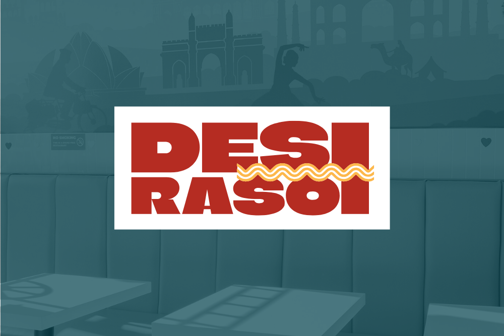 Logo reading 'DESI RASOI' in bold red letters with a wavy yellow design through 'RASOI', placed over a photo of a restaurant interior with booths and tables.