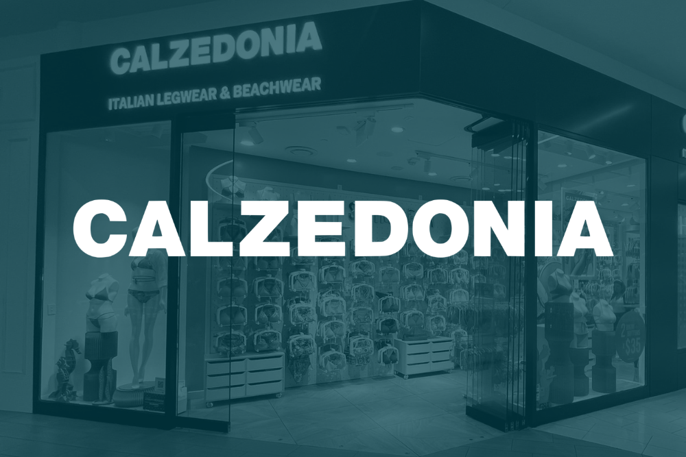 Storefront of Calzedonia, a retailer specializing in Italian legwear and beachwear, with mannequins and products displayed inside.