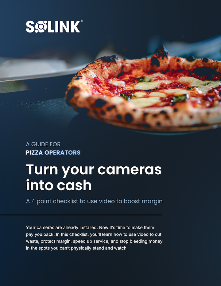 A pizza on a metal spatula in front of a blurred background, with text promoting a video checklist for pizza operators to boost profit using security cameras.