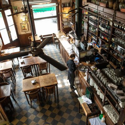 Waitress setting things up before start of working day in traditional coffee shop in Buenos Aires Exception-based reporting video